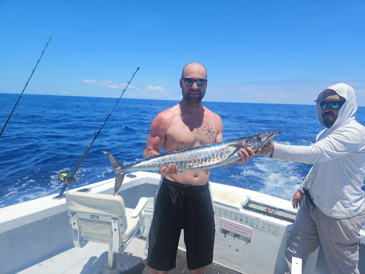 Man with kingfish catch